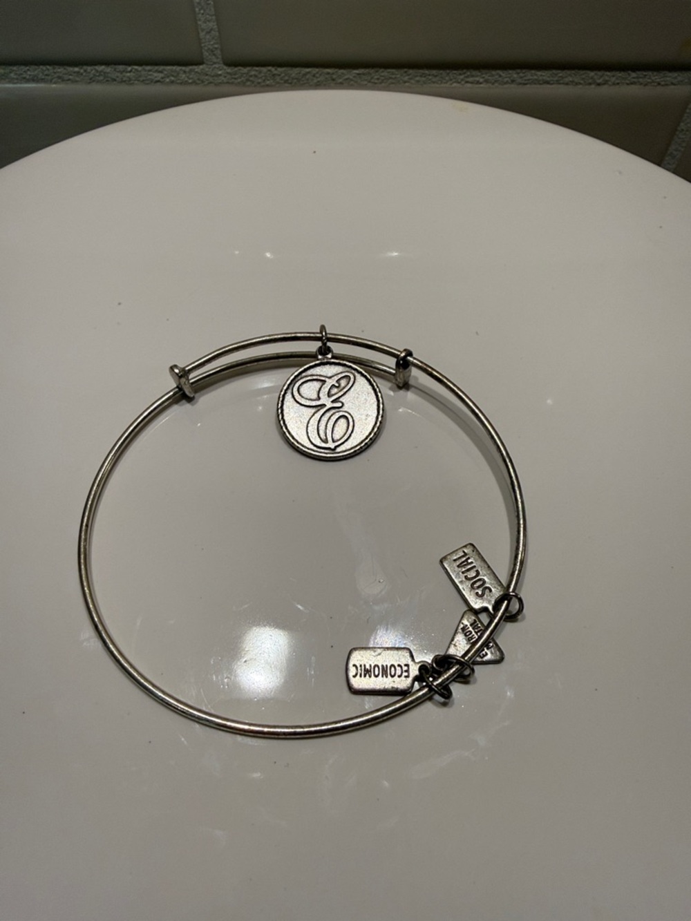 Wind and Fire adjustable “E” charm bracelet